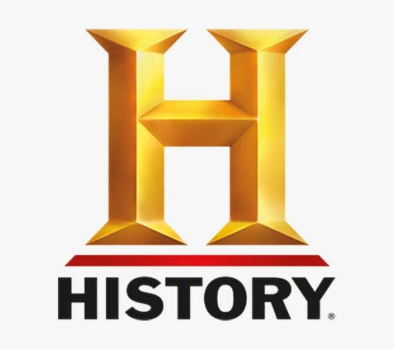 A gold colored logo of the history channel.